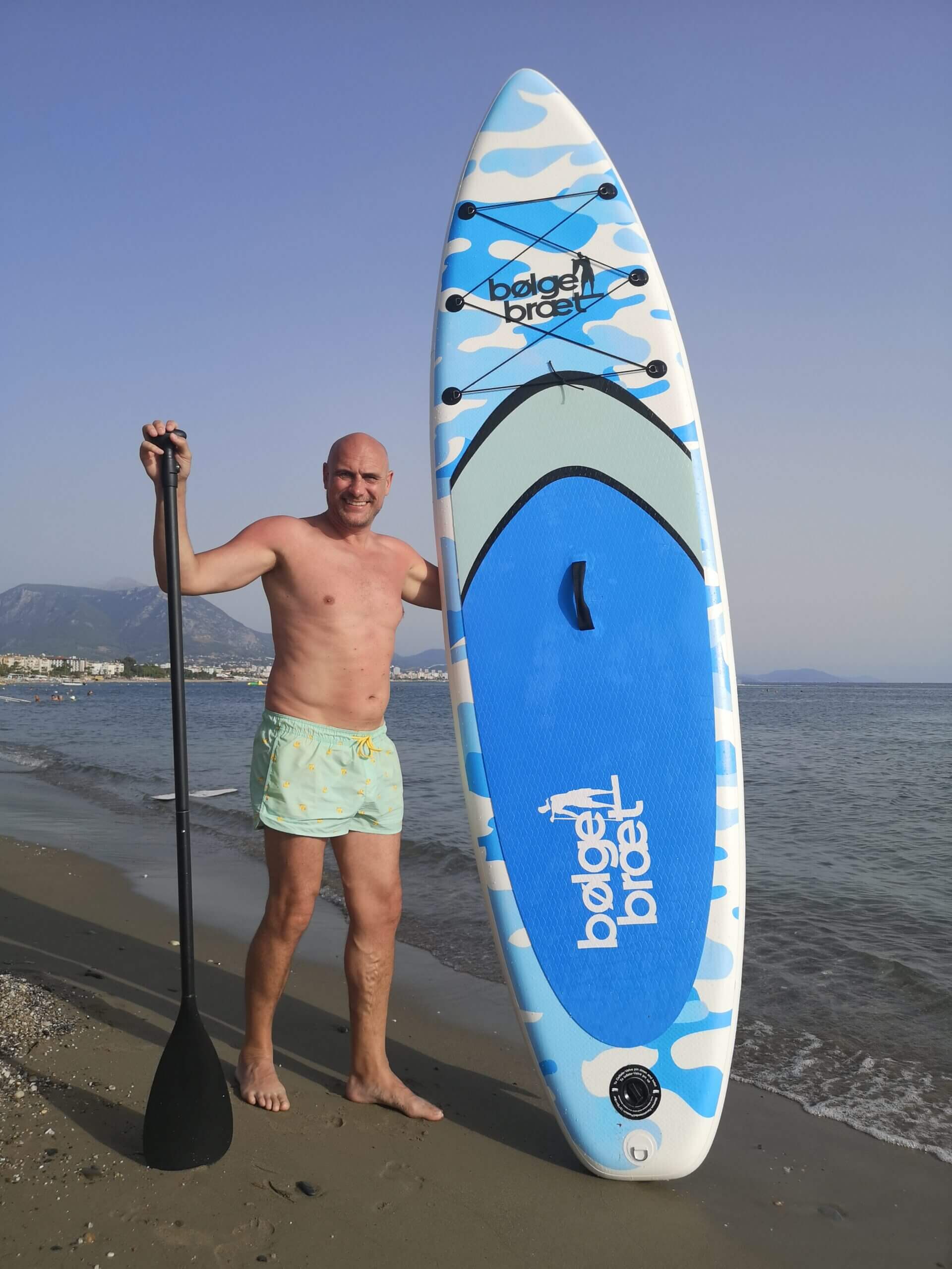 SUP board blue camo beach warm sun